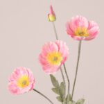 Pink faux poppy stem with layered silk petals and realistic center, ideal for wedding decor and event floral arrangements.