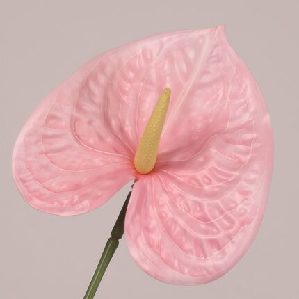 Pink faux anthurium stem with soft veined spathe and realistic spadix, ideal for wedding decor and event floral arrangements