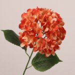 Orange faux hydrangea stem with layered petals and realistic leaves, suitable for wedding decor, event floral arrangement, and hotel styling