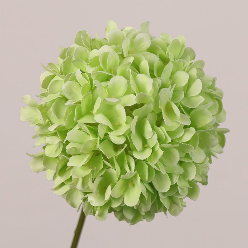 Light green faux hydrangea ball stem with soft layered petals, natural texture, ideal for wedding decor and event floral arrangements