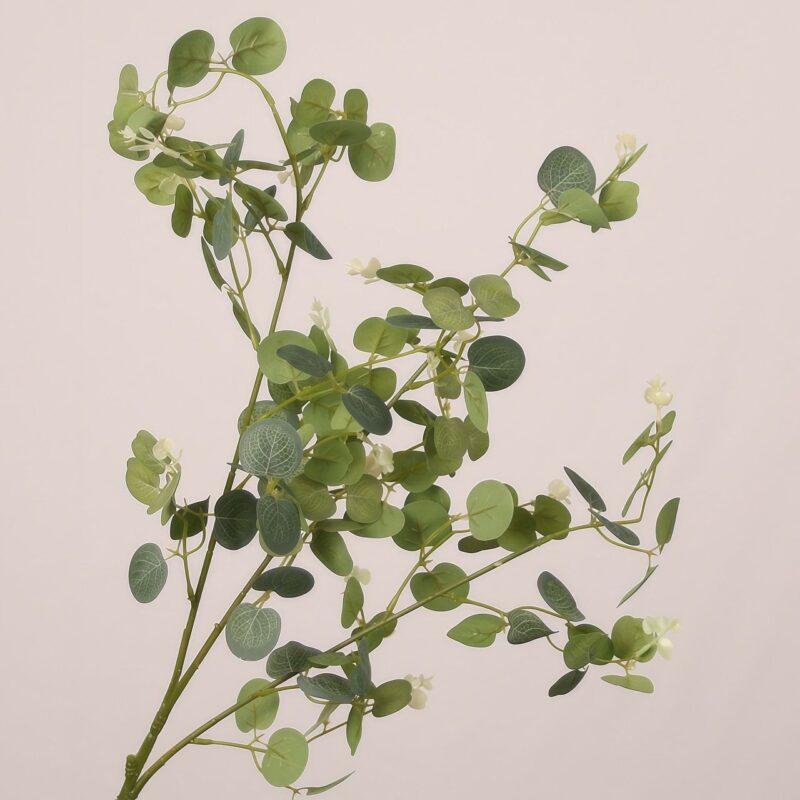 Detailed faux eucalyptus stem with round green leaves and branching for wedding decor and event floral design