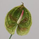 Green faux anthurium stem with realistic veining and smooth finish for wedding decor and contemporary event floral arrangement use