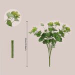 Tall faux eucalyptus stem shown with size reference for large scale wedding decor and professional event floral design