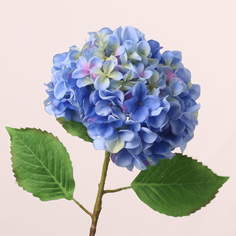 Single blue artificial hydrangea stem with realistic green leaves for bouquets, wedding decoration and event styling