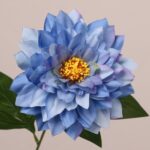 Blue faux dahlia flower with layered silk petals and detailed yellow center for wedding and event floral decor