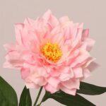 Light pink faux dahlia flower with soft layered petals and realistic structure for wedding floral arrangements