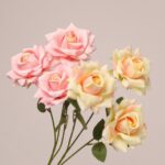 Mixed pink and yellow faux rose bouquet with multiple blooms for wedding and event floral decoration