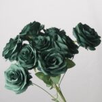 Emerald green faux rose bouquet with detailed layered petals for wedding decor and luxury event floral arrangement display
