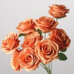 Burnt orange faux rose bouquet with realistic layered petals for wedding decor and autumn event floral arrangement