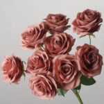 Dusty rose faux rose bouquet with layered petals and realistic texture for wedding decor and event floral arrangement styling