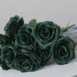 Emerald green faux rose bouquet with detailed layered petals for wedding decor and luxury event floral arrangement display
