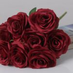 Deep red faux rose bouquet with rich layered petals for wedding decor and elegant event floral arrangement design