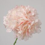 Blush pink faux hydrangea stem with full layered petals for wedding decor and elegant event floral arrangement styling