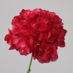 Red faux hydrangea stem with full rounded bloom for wedding decor and bold event floral arrangement styling