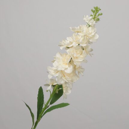Cream faux delphinium stem with layered blossoms for wedding decor and elegant event floral arrangement display