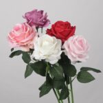 Assorted color faux rose stems including mauve, pink, white and red for wedding decor and event floral arrangement styling