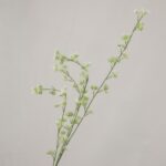 Close-up of a tall artificial white filler flower branch with delicate clustered petals and green stems by NB8.