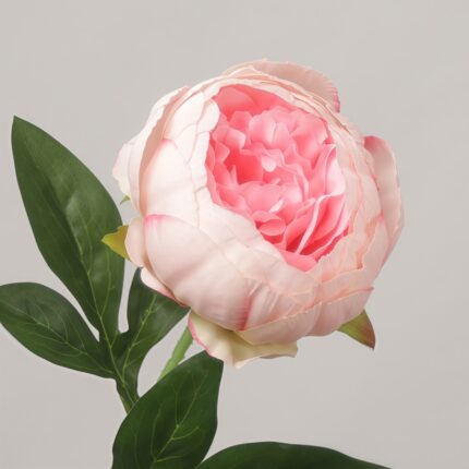 Soft blush pink artificial peony flower close-up showing intricate, layered silk petals and realistic foliage by NB8.