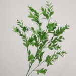 A side view of NB8 artificial greenery branches with dense foliage, ideal for wedding arch decor and tall vase fillers.