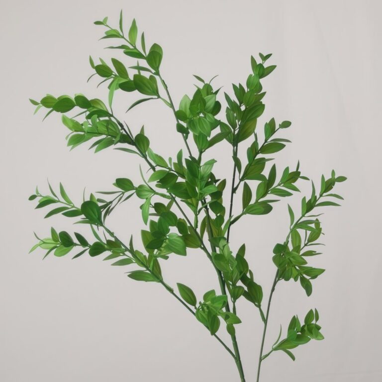 Close-up of NB8 artificial Italian Ruscus leaves showing realistic vein textures and vibrant green color for floral arrangements.