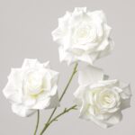 Close-up of a pure white artificial tulip from NB8, featuring a lifelike bud and natural-looking green stem.