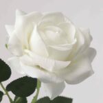 Close-up of a high-quality NB8 white artificial rose showing detailed petal layers and realistic texture.