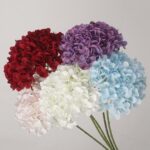 NB8Floral artificial hydrangea bundle featuring five realistic silk stems in red, purple, blush pink, white, and baby blue.