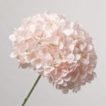 Close-up of an NB8Floral blush pink artificial hydrangea flower head with delicate, layered silk faux petals