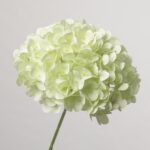 A delicate pale green artificial hydrangea stem by NB8Floral with soft, fresh mint-colored silk petals.