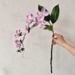 Artificial silk jasmine floral arrangement with pink blossoms and green leaves for home decor.