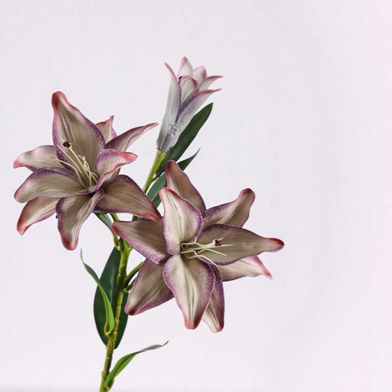 Three artificial PVC lily flowers attached to a stem for durable home decoration