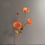 Artificial silk poppy bouquet featuring 4 blooms on stems, ideal for elegant home decor arrangements.