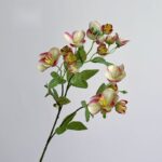 Artificial silk Eranthis flowers cluster in cream and blush pink tones, ideal for decor.