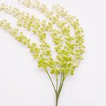 Realistic artificial pale green dangling flowers suitable for decor or craft projects.