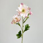 Artificial silk clematis bouquet with three delicate heads of pale pink and cream blossoms.