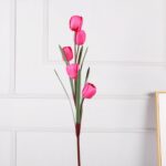 Elegant artificial silk tulips cluster in vibrant pink tones against a clean white background.