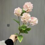 Artificial blush pink silk hydrangea bouquet with four heads, perfect for home decor.