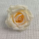Realistic cream silk rose head measuring 10 cm for artificial flower bouquets and decor