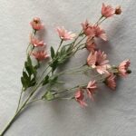 Bundle of realistic silk daisies perfect for artificial wedding flowers or general home decor.