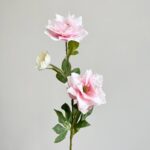 Elegant set of three silk faux clematis blooms in blush pink tones for home decor.