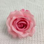 Beautiful pink artificial silk rose flower head, perfect for realistic home decor accents