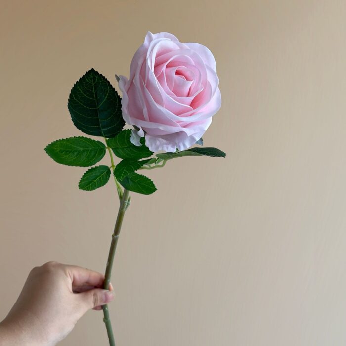 Realistic pink faux rose artificial flower stem for wedding and home decor.