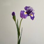 Realistic artificial deep purple iris flowers, sold in a pair on a stem for crafting or decor.