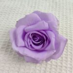 Realistic purple silk faux rose bloom for everlasting home decor accents and arrangements.