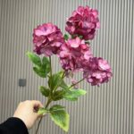 Artificial silk hydrangea bouquet featuring four lush pink flower heads for home decoration.