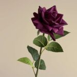 Deep purple faux rose on a stem, perfect for realistic artificial wedding or home decor accents.