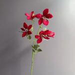 Artificial red silk lily flower arrangement on a stem for home decor.