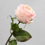 Realistic pink rose artificial flower for wedding centerpieces or faux home decor accents.