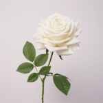 Realistic white faux rose bloom on a stem, suitable for wedding or home décor.