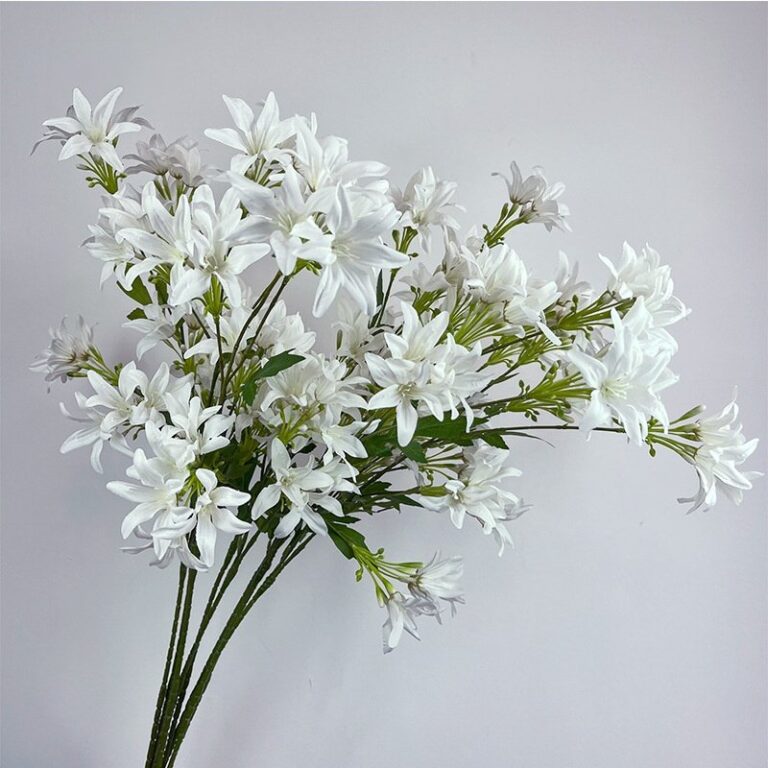 Bouquet of artificial white silk lilies featuring seven heads, perfect for realistic home decor.